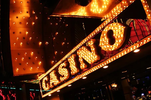 jagotogel live baccarat studio showing dealer, cards, and multi-camera setup